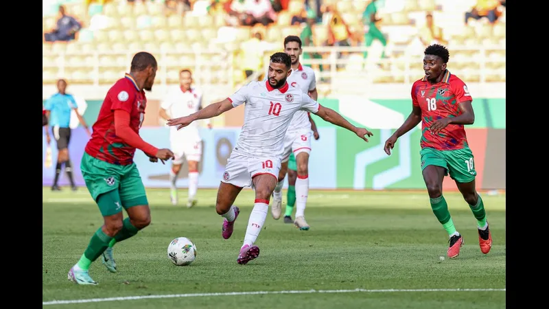 Cầu thủ Tunisia với biểu cảm hứng khởi sau khi ghi bàn vào lưới Namibia Cầu thủ Tunisia với biểu cảm hứng khởi sau khi ghi bàn vào lưới Namibia